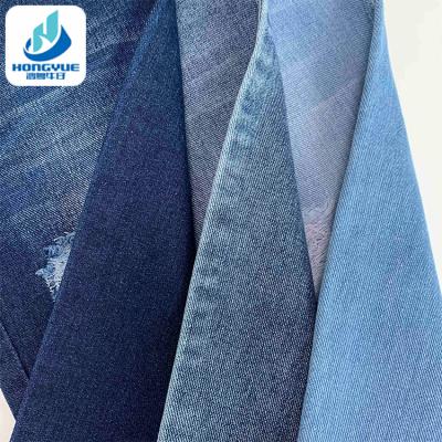 China Wrinkle Resistant Non-stretch 9.7oz 85% Cotton Blue Woven Raw Denim Fabric Suppliers for sale