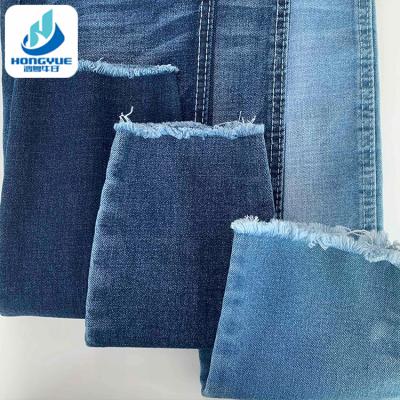 China Wholesale Breathable Good Running Lot Woven Stretch Blue Stock Denim Fabric 10.5oz for sale