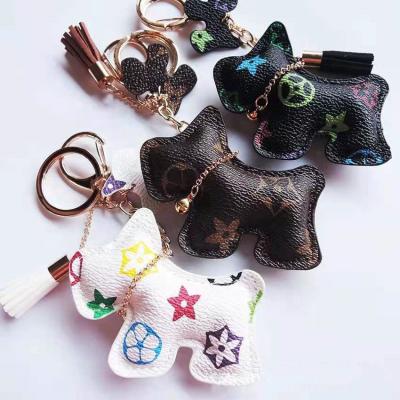 China Cute New Design Leather Schnauzer Cartoon Dog Men And Women Couples Car Bracelet Key Chain for sale