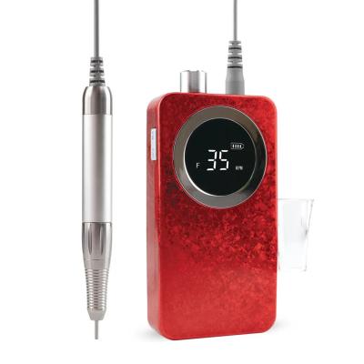 China Nail Cosmetics Look! 2023 Amazing Cordless Portable Brushless Ice Flower Red Color Nail Drill Machine 35000 RPM Brushless Professional for sale