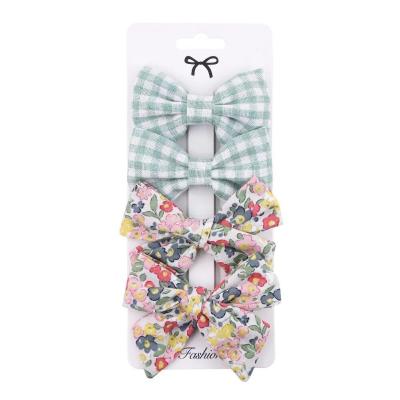 China New Friendly Material Girls Cute Plaid Print Star Hairpins For Children Kids Headband Soft Hair Clips Fashion Bow Accessories for sale