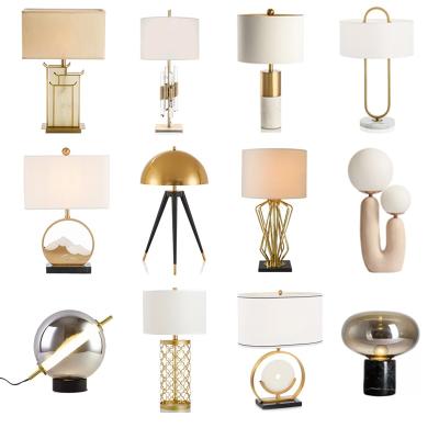 China Nordic simple European bedroom creative marble living room bed lamp desk fabric wrought iron gold hotel glass lamp for sale