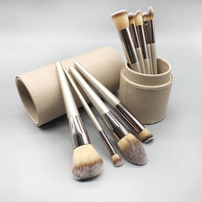 China Angular Blush Customize Champagne Color Wood To Handle Synthetic Hair Makeup Brush Set With Champagne Color Stand Case for sale