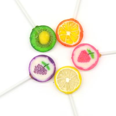 China halal long stick fruit flavor assorted fruit shape lollipop sweet hard candy companies for sale