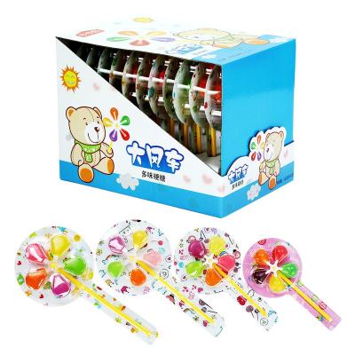 China china high quality cheap price colorful fruit flavor windmill pinwheel lollipop candy factory à venda