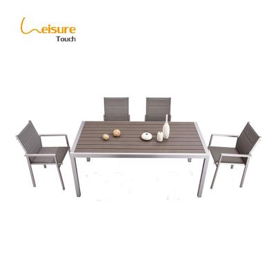 China Modern Plastic Wood Top Aluminum Patio Table And Chairs Outdoor Dining Set for sale