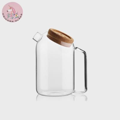 China High Borosilicate 42oz/1200ml High Borosilicate Hot/Cold Water Jug Viable Glass Iced Tea Juice Beverage Carafe With Cork Handle And Lid for sale