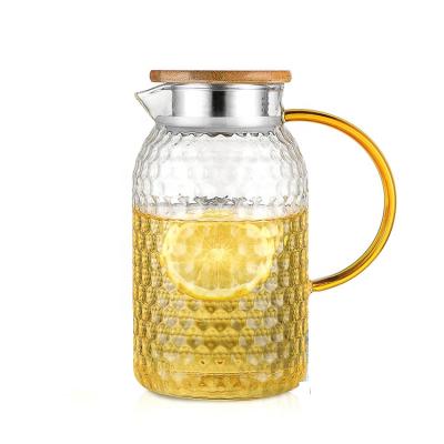 China Sustainable Wholesale Heat Resistant Food Grade High Borosilicate Glass Water Pitcher With Stainless Steel Lid for sale