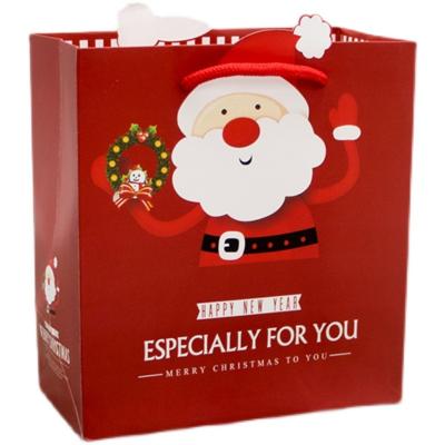 China Hot Selling New Type Wholesale Recyclable Christmas Gift Wrapping Paper Bag With Logo Print for sale