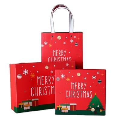 China New Arrival Top Quality Customized Christmas Paper Gift Tote Recyclable Packaging Bags for sale