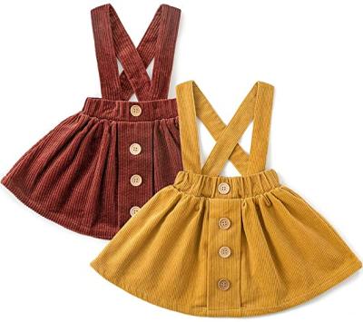 China Solid Corduroy Skirt Girls' Suspender Kids Button Skirts for sale