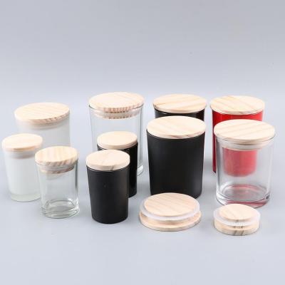 China Simple Custom Logo Frosted Luxury Clear Empty Glass Candle Jar Containers Private Label Candle Jars With Wooden Lids In Bulk for sale