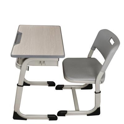 China Bedroom Furniture Adjustable Single Student Table And Chair Set for Education Materials for sale