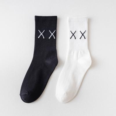 China Custom Breathable White Black Running Socks Logo Printing Design Cotton Athletic Sports Crew Socks for sale