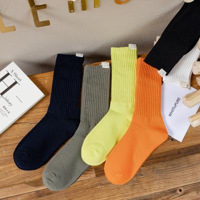 China New Arrivals Solid Color Student Boy Socks Manufacturer Organic Cotton Cool Sports Running Crew Socks for sale