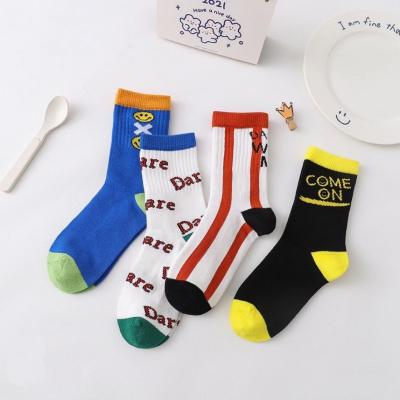 China QUICK DRY Soft Breathable Baby Boys Design Fashion Sock Tube Kid Cotton Happy Socks for sale