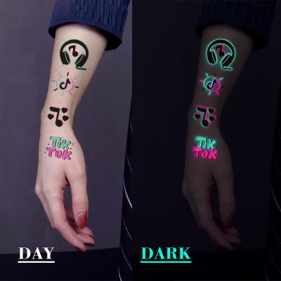 China DONGYEA Temporary Tattoo Sticker Art Decal Waterproof Tik Tok Halloween DIY Arm Face Fluorescent Tattoo Prom Party Sticker for sale