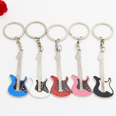 China Black Guitar Wallet Fashion Key Bag Metal Colorful Zinc Alloy Pendant Small Mini Key Chain and Red for sale