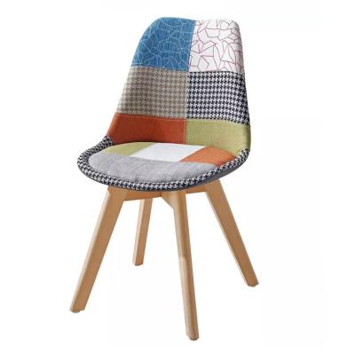 China Modern Chair Fabric Patchwork Dining Chair With Wooden Legs for sale