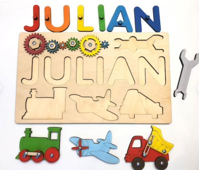 China 2021 New Name Puzzle Board Educational Custom Wooden Busy Board Sensory Toy Board Gift For Toddler for sale