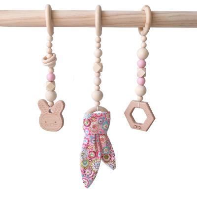 China Detachable Early Living Baby Gym Toys Infants Bedroom Decor Funny Educational Activity Toy Wooden Play Gym Hanging for sale