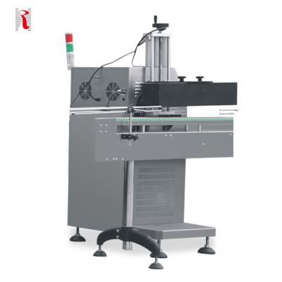 China HIS-M2 Automatic Water Cooled Food Induction Sealing Machine With Conveyor Belt for sale