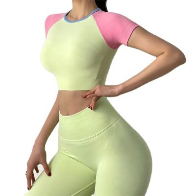 China Customized Breathable Candy Color Stitching Fitness Suit Women's Short Sleeve Quick-drying Sports Belly Button Yoga Top T-shirt for sale