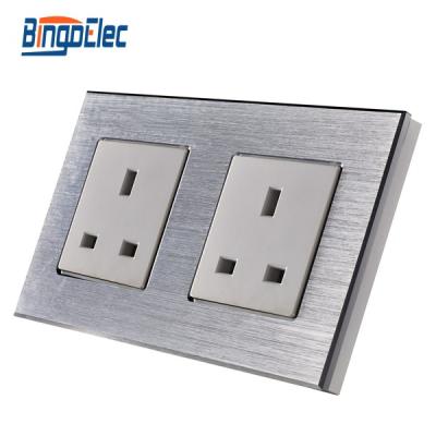 China Modern Design Residential / General Purpose Silver Aluminum Panel Double 13a UK Socket Outlet Wall Socket AC 110-250V for sale