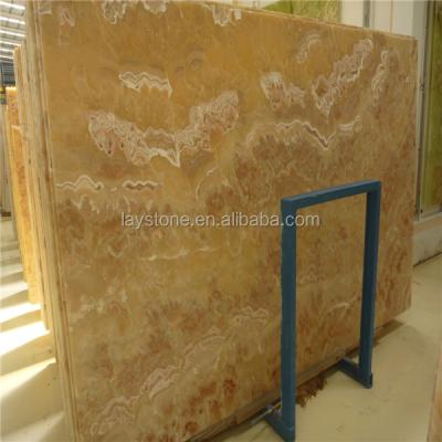 China Yellow Jade Onyx Stone Polished Slab Precious Marble Floor Tile Price for sale