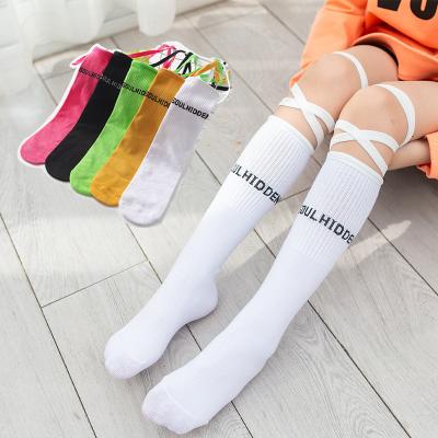 China Breathable Spring Autumn Pure Color Calf Girls Fashion Socks Girls Colorful Socks Kids Long Sock With Rope for sale