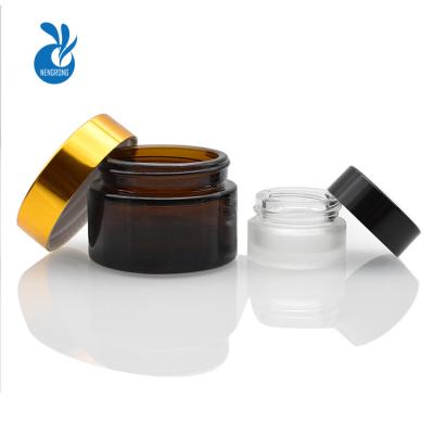 China Eye Cream 1oz 2oz Round Amber Glass Jars With White Inner Layers And Black Lids Lotion Glass Jars Prefect For Cosmetics And Face Cream for sale