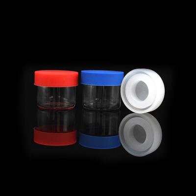 China Customized small logo small 5ml 6ml glass container jars with press around black silicone lid for wax oil for sale