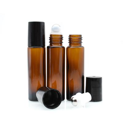 China Cosmetic Empty Cosmetic Roll On Bottle 8ml 10ml Roll On Perfume Bottle 10ml Amber Glass Roll On Bottles With Roller Steel Ball Black Cap for sale