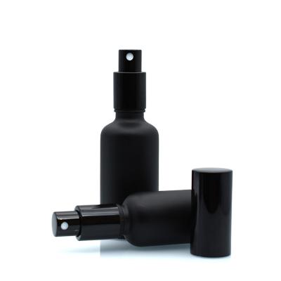 China Cosmetic Bottle 5ml 20ml 100ml 10ml 15ml 30ml 50ml Black Matte Black Glass Mist Spray Essential Oil Spray Bottle With Aluminum Sprayer Cap for sale