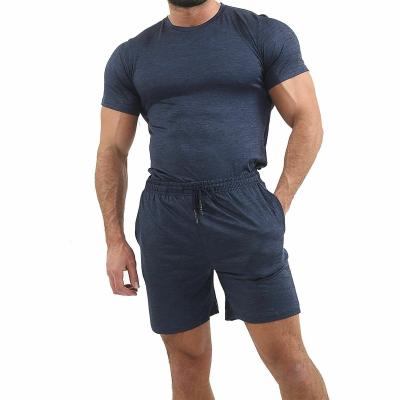 China Breathable solid color men two piece pant set men's sportwear workout short sets for sale