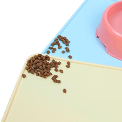 China BPA Sustainable Silicone Pet Feeding Mat Dishwasher Safe Waterproof Raised Edge Easy Clean Pets Free Placement Tray Mats to Stop Food Puddle for sale