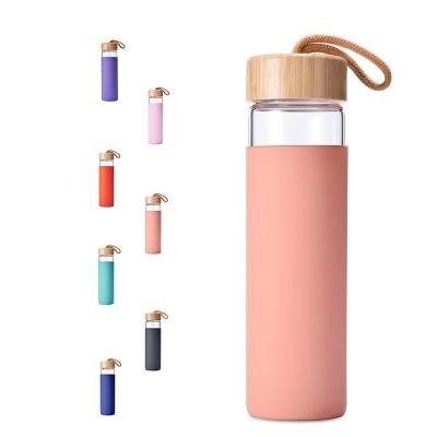 China Wholesale 600ml Viable Leakproof Child Water Bottle High Borosilicate Glass Water Bottle With Bamboo Lid for sale