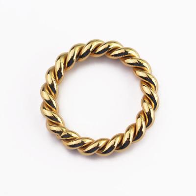 China Simple CLASSIC twist ring stainless steel gold plated permanent rings for men and women ring light for sale