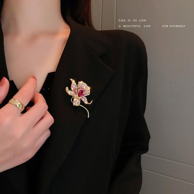 China ALLOY color rhinestone lily lady's bodice suit pin factory flowers luxury brooch for women for sale