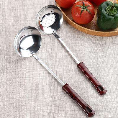 China Viable Wholesale Bonus Handle Bakelite Kitchenware Stainless Steel Kitchenware Cooking Tools for sale