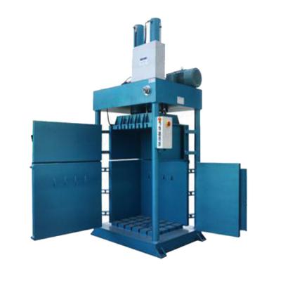 China Hydraulic Double Vertical Cylinders Waste Cylinders PET Bottle Baler Four-Door Opening Baler Pressing And Wrapping Machine for sale