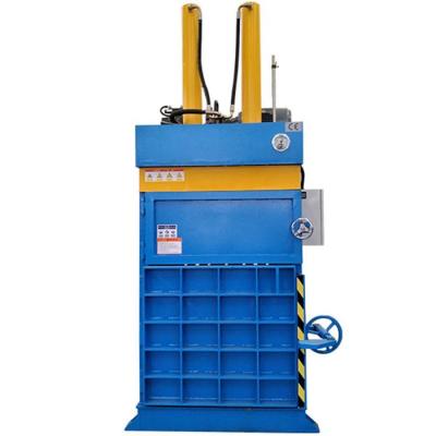 China 60 Ton Hydraulic Vertical Waste Cardboard Pressing Baler Plastic Baler Pressing And Wrapping Machine for sale