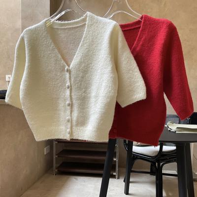 China New Spring V-neck Anti-wrinkle High-waisted Soft Loose Sweater Leisure Knitting Cardigan Woman Short Sleeve for sale