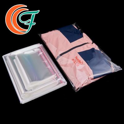 Cina Custom Clear Plastic Shirt Bag Clear And Self Sealing Adhesive OPP Plastic Poly Bags in vendita