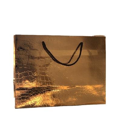 China 2021 Recyclable Rose Gold Wholesale Custom Paper Bag Wedding Gift Bag Luxury Shopping Paper Bag for sale