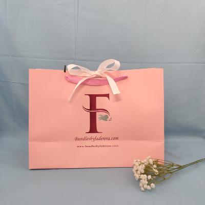 China Hot Selling Recyclable Gift Box Paper Bag Gift Packaging Wedding Customized Gift Bags With Ribbon for sale