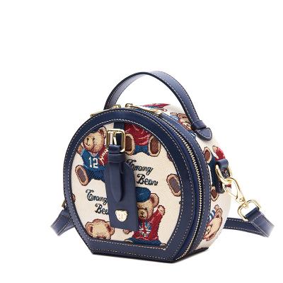 China Fashion Manufacturers Selling Round Bag Jacquard Cartoon Bear Lock Strap Best Metal Soft Purses for sale