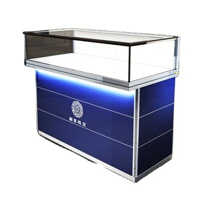 China Custom Made Showroom Custom Blue Glass Case Half Vision Gold Jewelry Display Showcase With Led Lights China for sale