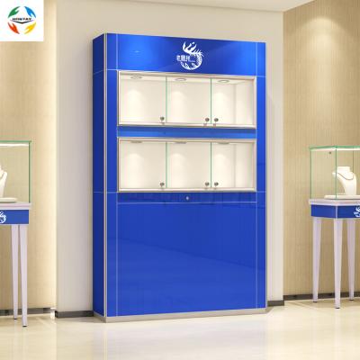 China Custom Brand Logo Custom Wall High Back Showcase Floor Top Floor Blue Custom High Back Wall Showcase Mirrored Glass Standing Jewelry Cabinet With LED Lights for sale