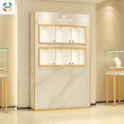 China Best Selling Wall Rack Design Wall Rack Design Wall Rack Best Selling Gold Metal White Marble Frame LED Light Tall Storage Cabinet for sale